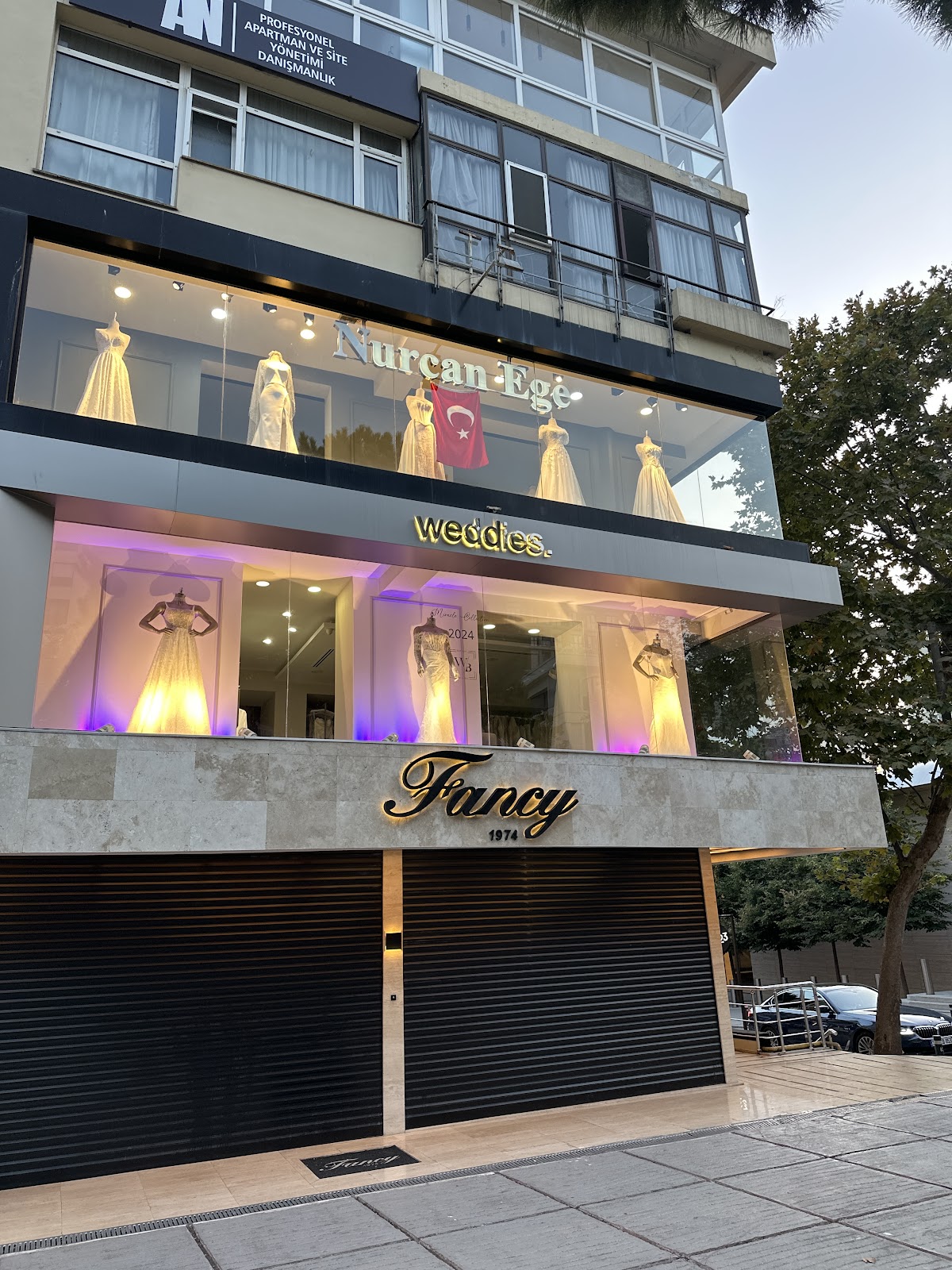 Nurcan Ege Gelinlik Modelleri Logo