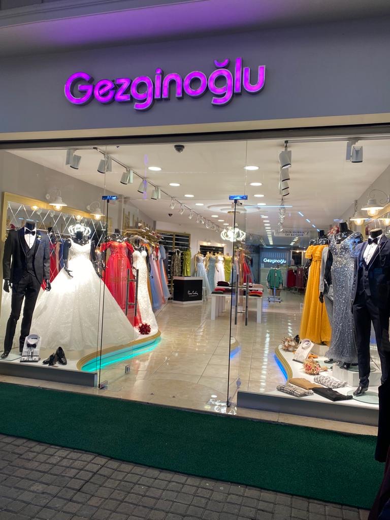 Gezginoğlu Gelinlik-Nişanlık-Abiye-Damatlık-Sünnetlik Logo