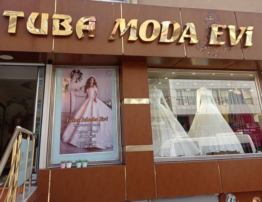 TUBA MODA EVİ Logo